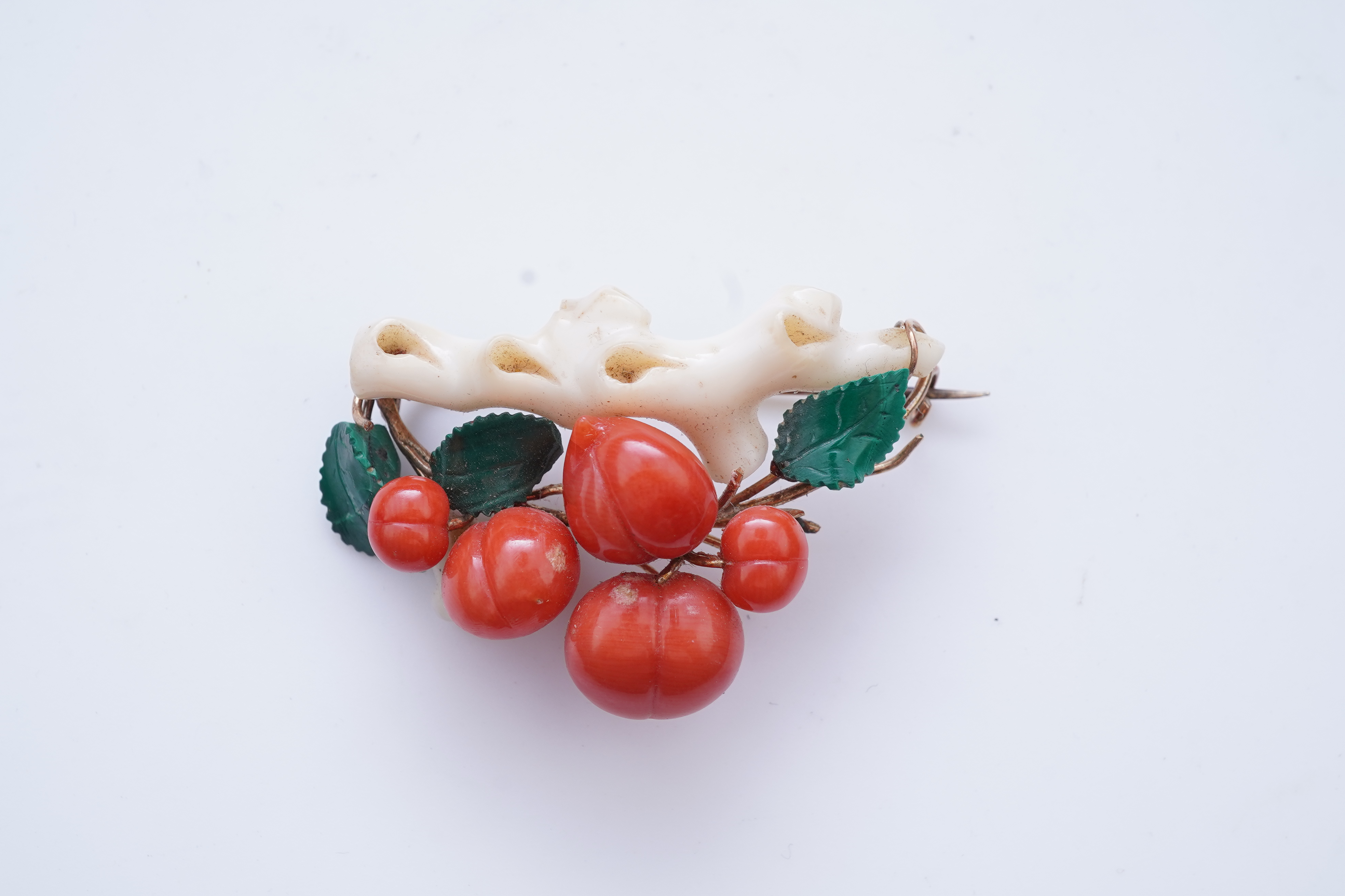 A rare coral and malachite demi-parure, mid 19th century and later